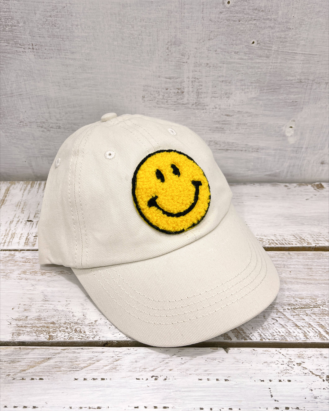 Kids cream cotton baseball cap with smiley patch